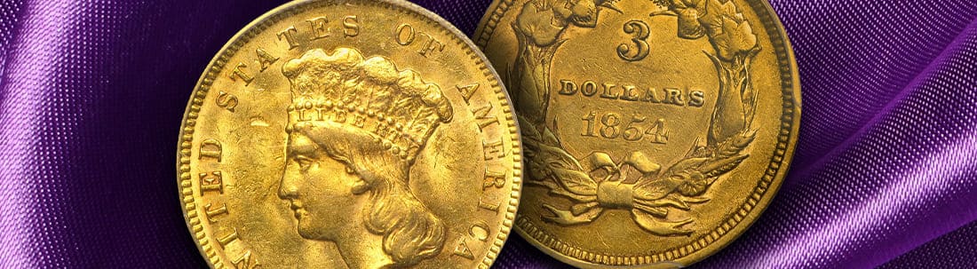 The obverse and reverse of a historic Gold Three Dollar coin set on a rich purple background.