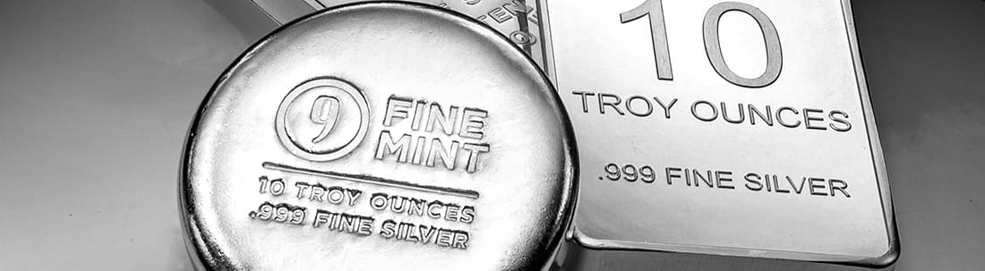 A close-up image of Silver 9Fine Mint products, including one 10 oz Silver round and bar.