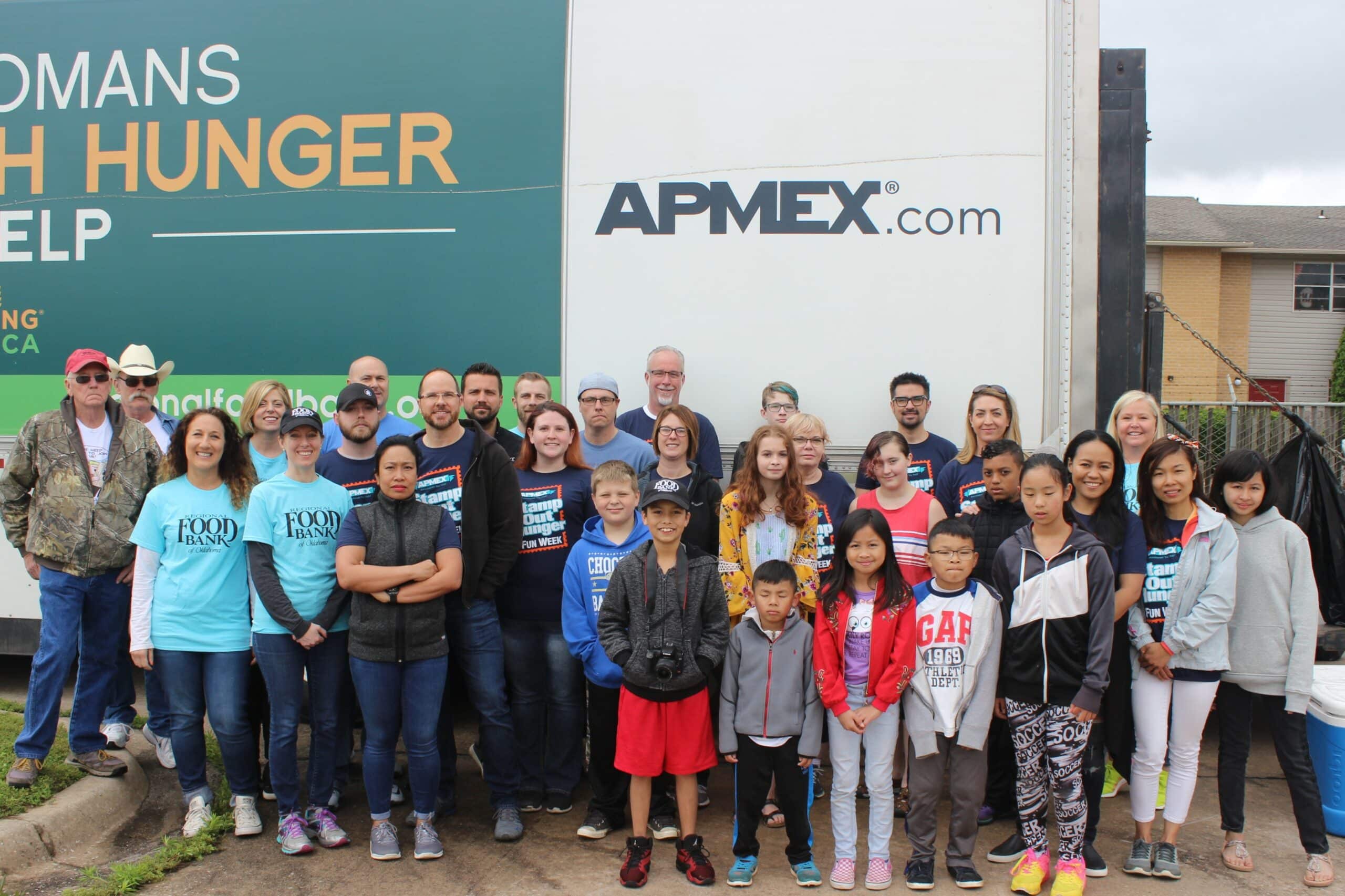 A group of people gathered to volunteer their time for the Regional Food Bank of Oklahoma.