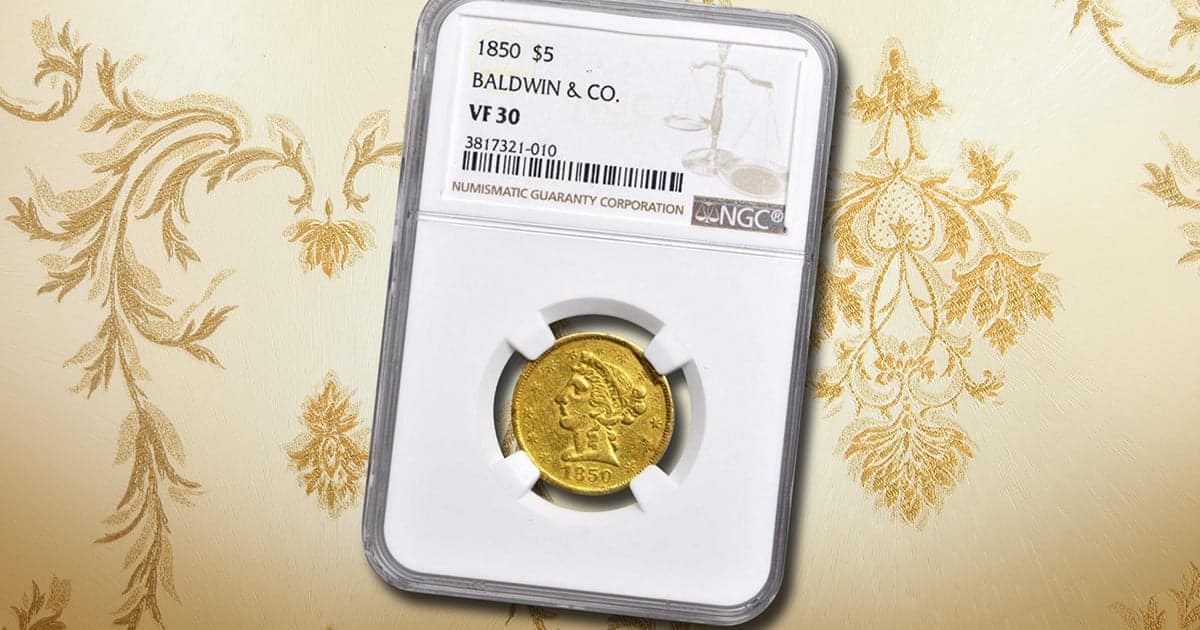 An 1850 Baldwin & Co. Gold Half Eagle in front of a decorative background.
