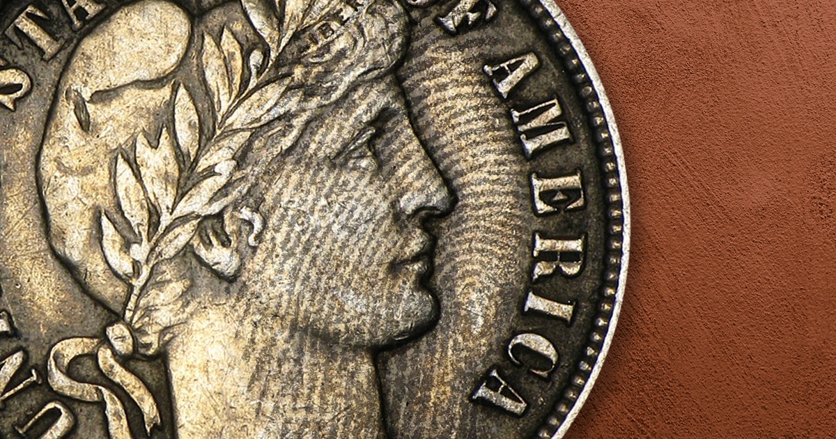 An image of a fingerprint on a coin.
