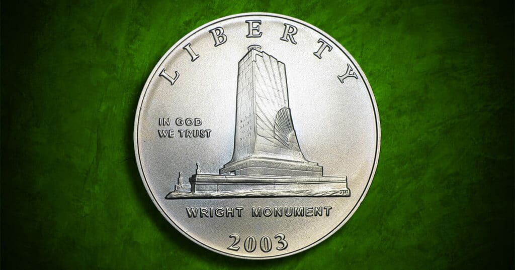 Coin Type - 2003 First Flight Centennial commemorative silver coin.