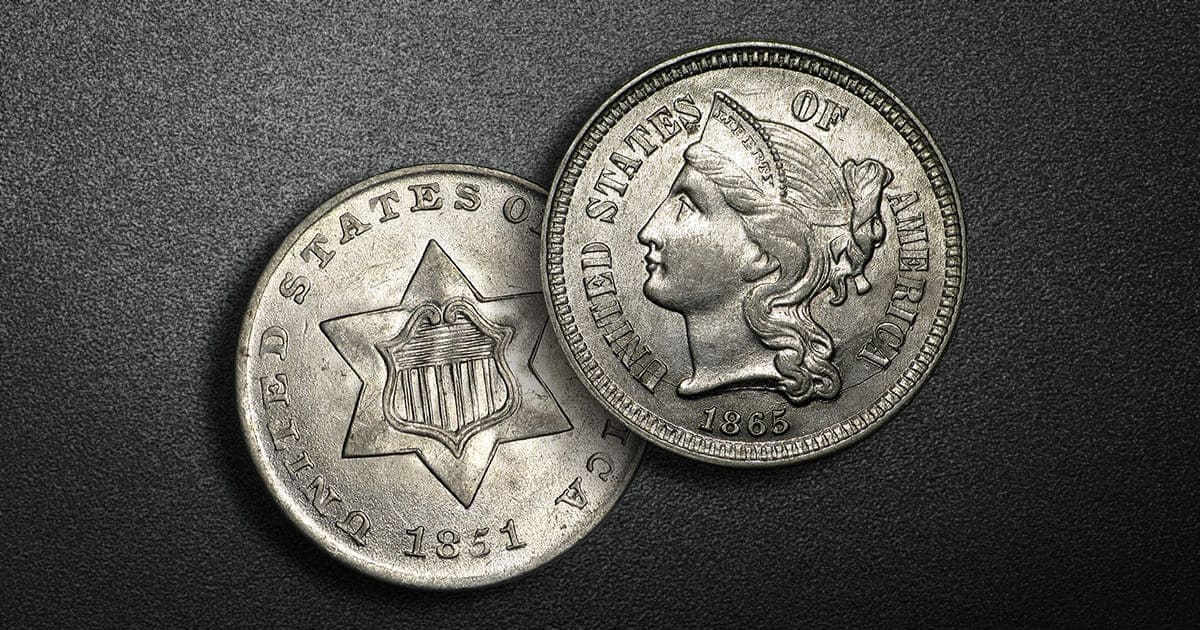 A Silver Trime and Three Cent Nickel are Obverse Facing in Front of a Background.