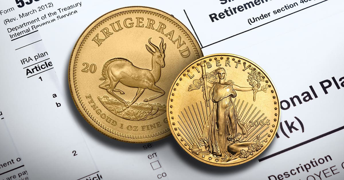 Two gold coins resting atop an IRA form.