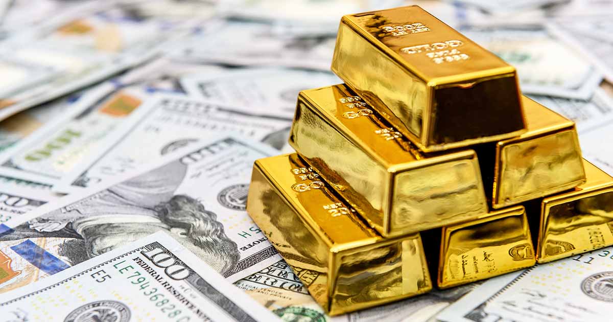 Gold bars and currency for an article titled: Gold Bullion vs Cash: Navigating the Investment Landscape.