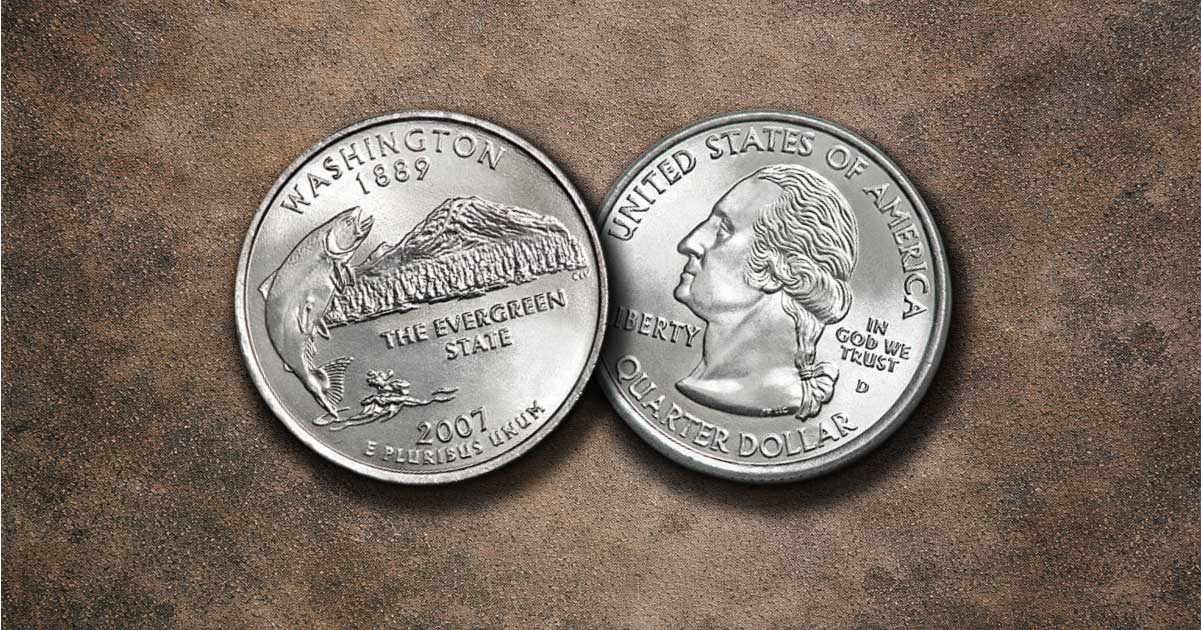 Washington state quarters on a table.
