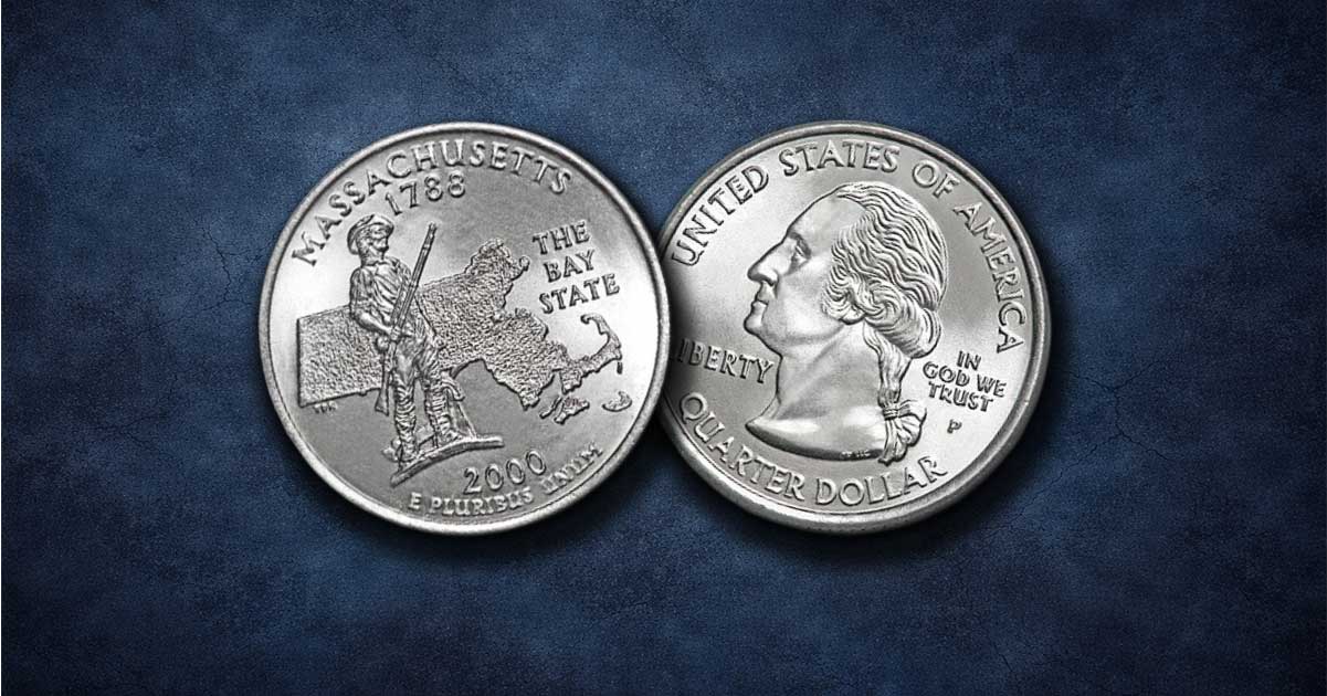 Two Massachusetts state quarters on a table.