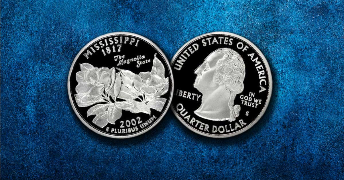 Two Mississippi state quarters on a table.
