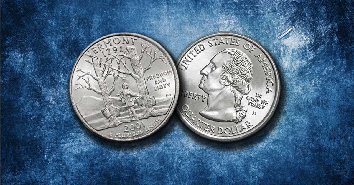 Two Vermont quarters sitting on a table.