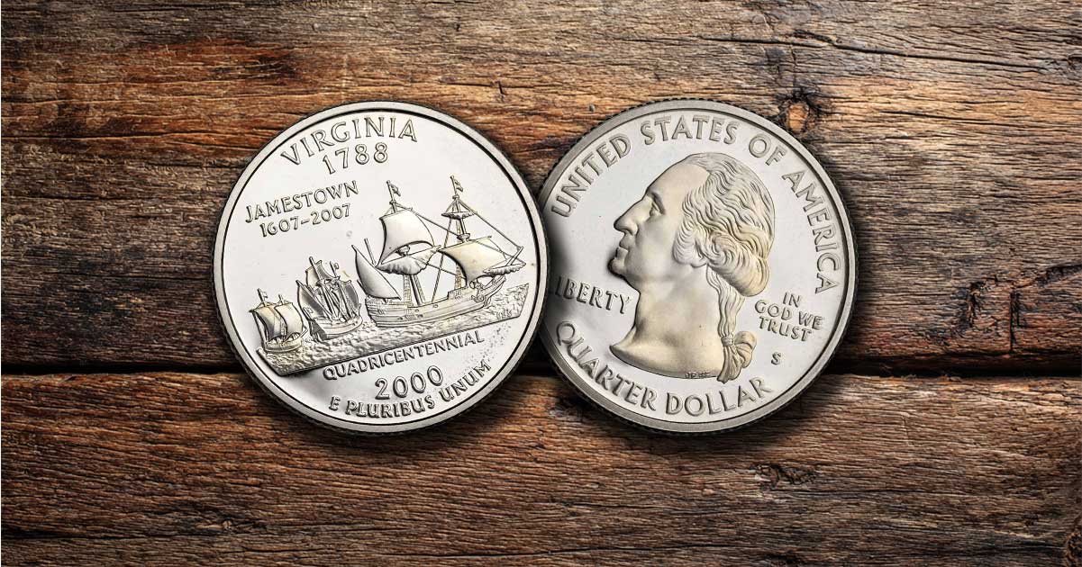 Two Virginia state quarters on a wooden table.